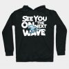 Surfer on a wave on the ocean Hoodie